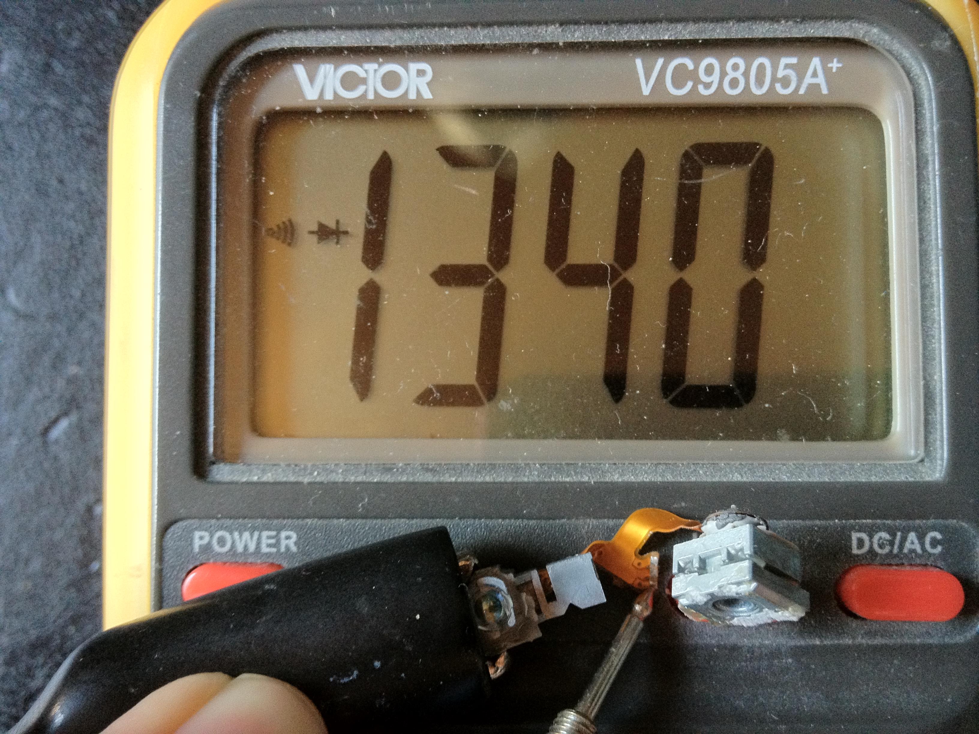 A second multimeter diode-test reading on the other laser diode
